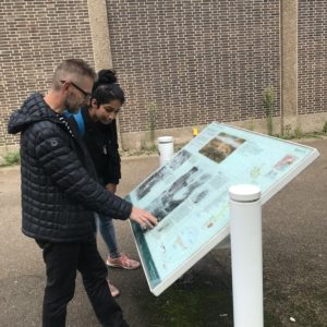 david gilbert and natasha joseph looking at a map of derby